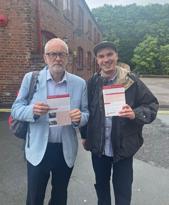 Joe Redmayne and Jeremy Corbyn at the Durham Miners Gala holding the Remember 1926 leaflets